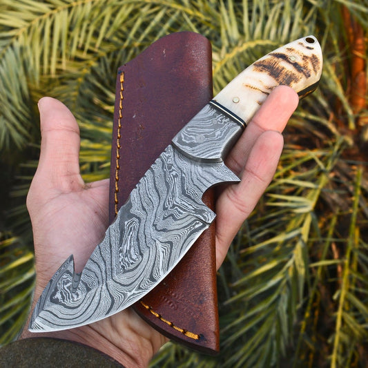 Handmade Damascus Steel Gut Hook Hunting Knife – Ram Horn Handle with Leather Sheath | Knives Zone