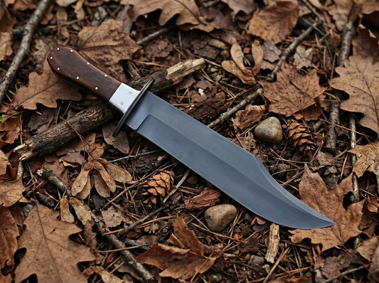 Knife with a wooden handle on a bed of leaves and twigs