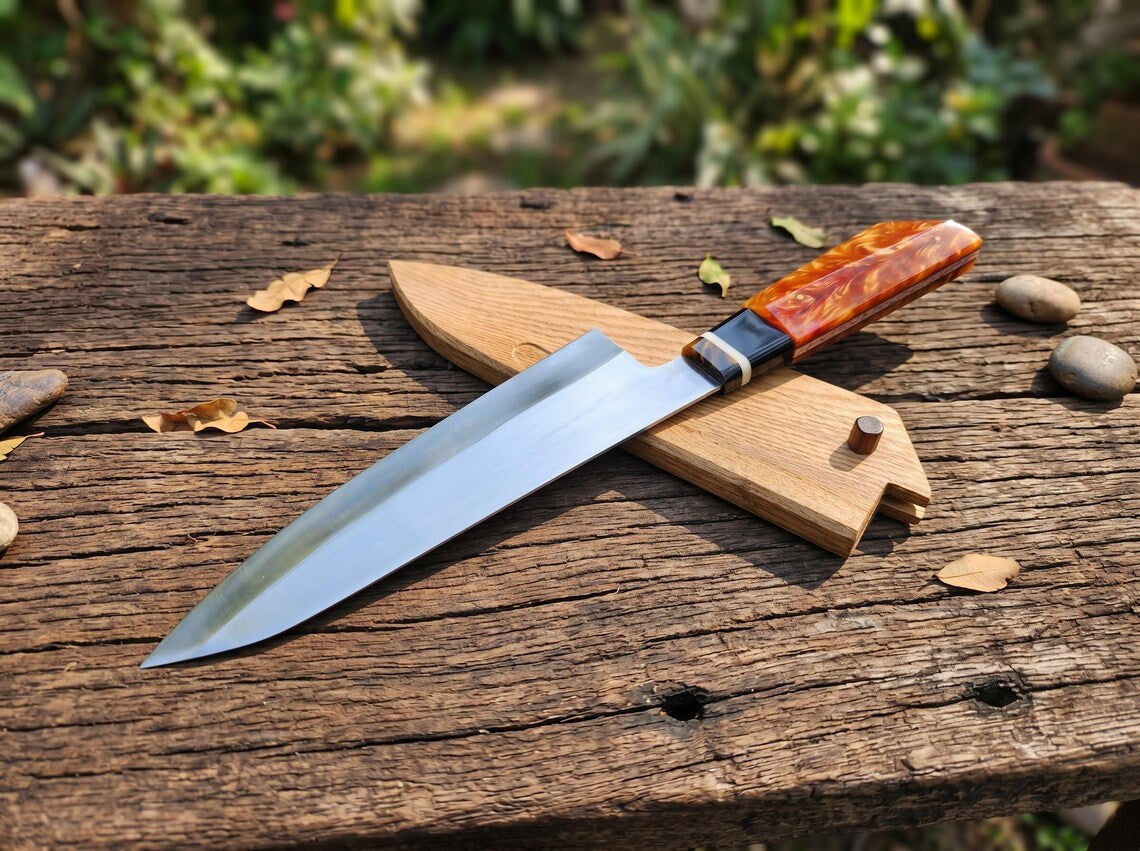 Knife with a wooden handle on a wooden surface outdoors